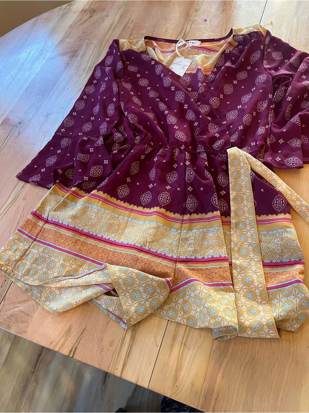 living doll Burgundy and Mustard Printed Romper